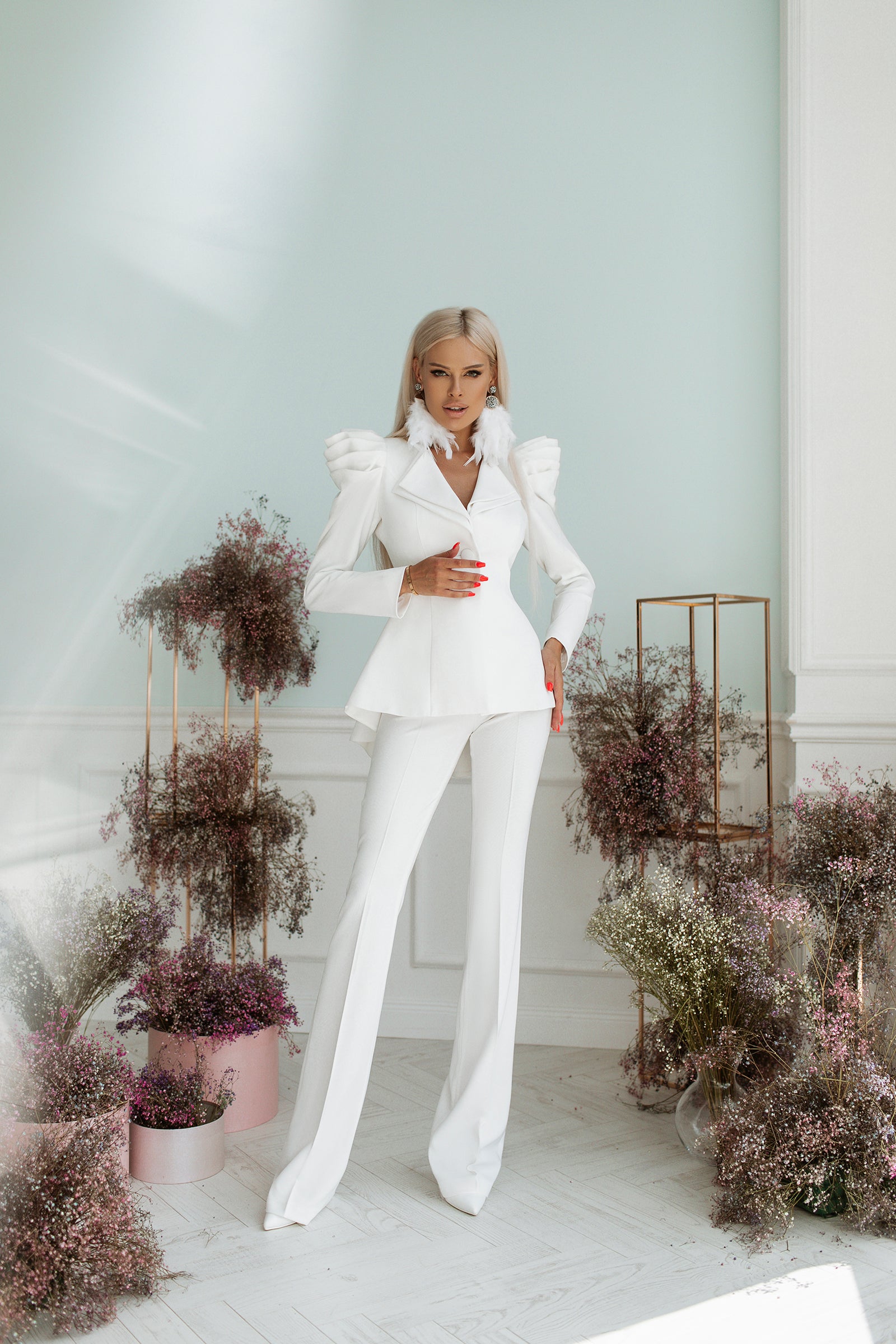 Pants Suit with Voluminous Shoulders and a Basque